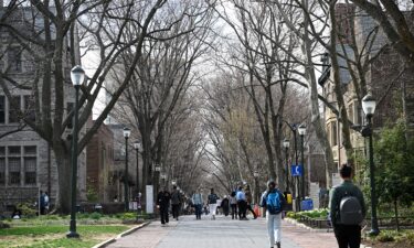People make their way through the University of Pennsylvania campus