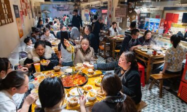 Chongqing Rail Transit Line 2 passes through a residential building in Liziba Station.