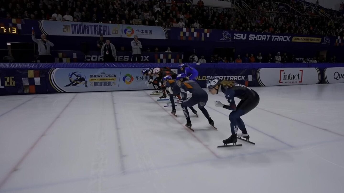 <i>NBC Olympics</i><br/>Corinne Stoddard and other skaters assume the starting position