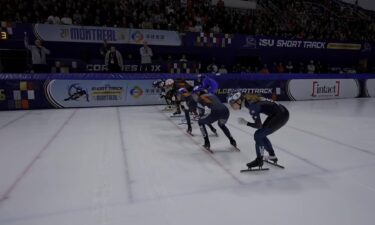 Corinne Stoddard and other skaters assume the starting position
