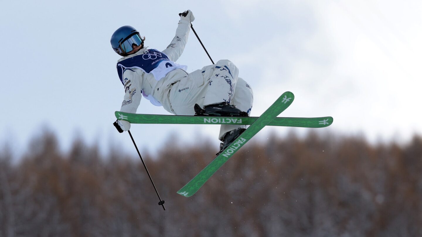 <i>NBC Olympics</i><br/>Eileen Gu performs a trick during freestyle skiing competition at the 2026 Milan Cortina Olympics.