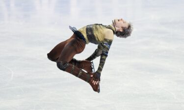Ilia Malinin performs a back flip during his short program at the 2026 World Figure Skating Championships.