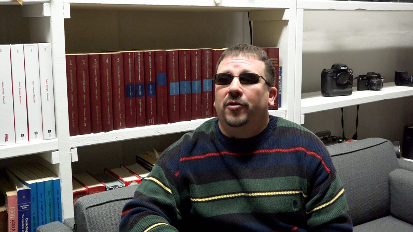 Travis Smith is being featured in this picture who's another school board candidate 