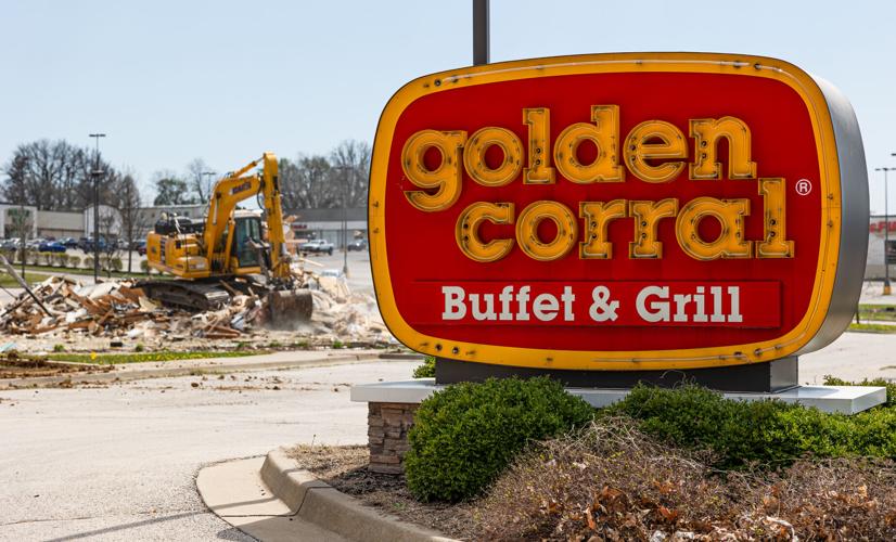 Construction crews with Madget Demolition in St. Joseph demolish the former Golden Corral at 715 N. Belt Highway on Monday in St. Joseph.
