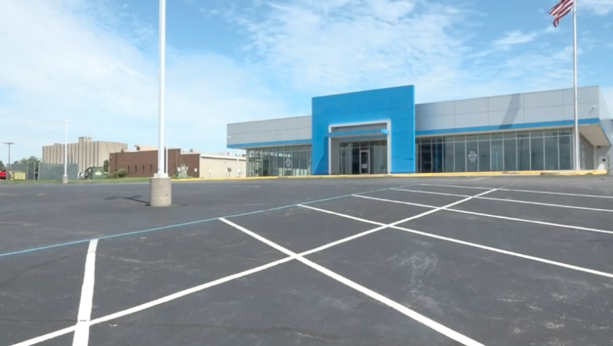 The former Reed Chevrolet building sits at the corner of Frederick Avenue and Woodbine Road. 