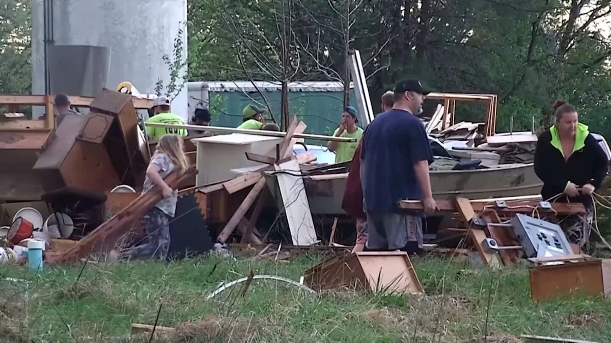 Residents in Clinton clean up after a severe thunderstorm spawned a possible tornado on Wednesday, April 15, 2026.
