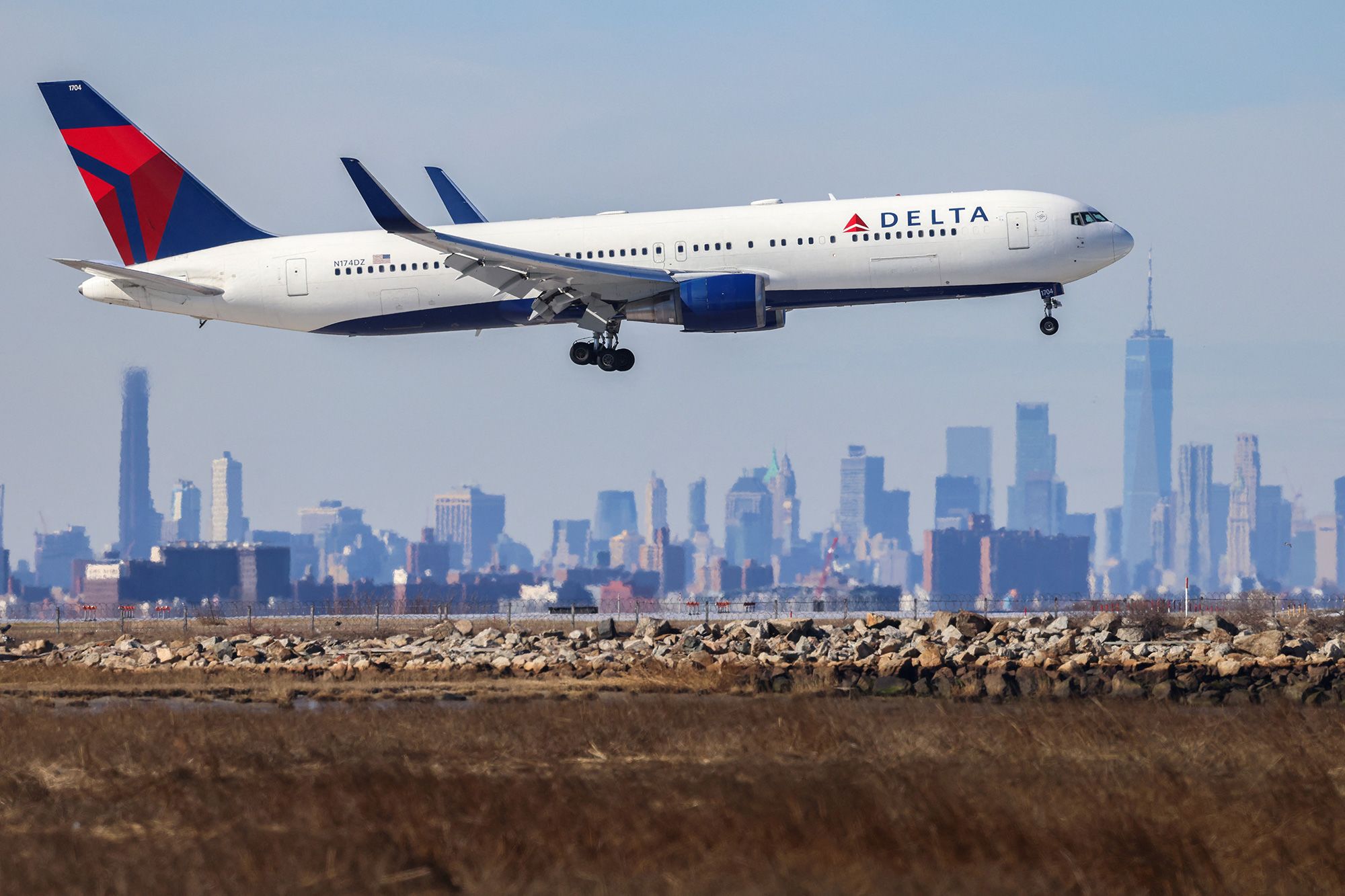 <i>Louis Nastro/Reuters via CNN Newsource</i><br/>A United Airlines Boeing 787 taxis as a Boeing 767 lands at San Francisco International Airport