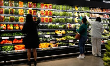 Shoppers pictured at an American grocery store.