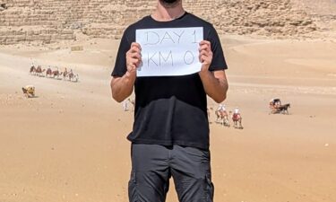 Omar Nok is pictured on a sailboat.