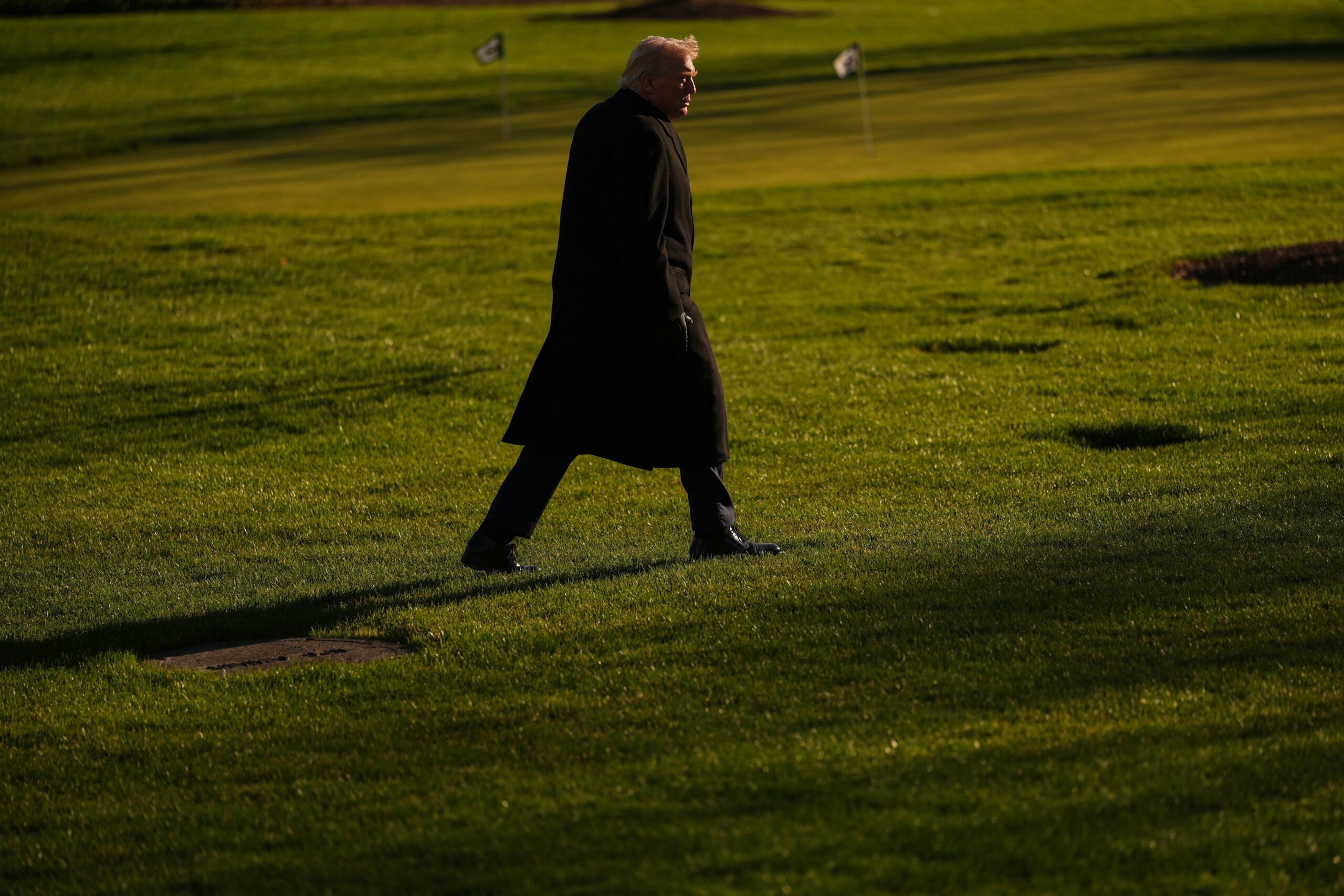 <i>Julia Demaree Nikhinson/AP via CNN Newsource</i><br/>President Donald Trump walks on the South Lawn of the White House on March 23.