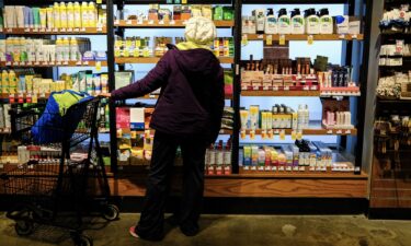 A customer shops for toiletries in a supermarket in New York on January 22.