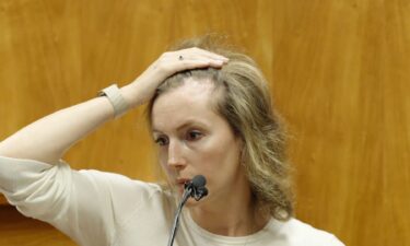 Arielle Konig displays a scar on her forehead during her testimony in Gerhardt Konig's trial.