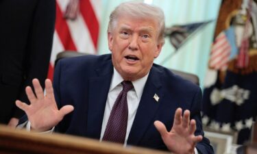 U.S. President Donald Trump speaks in the Oval Office of the White House on March 31.