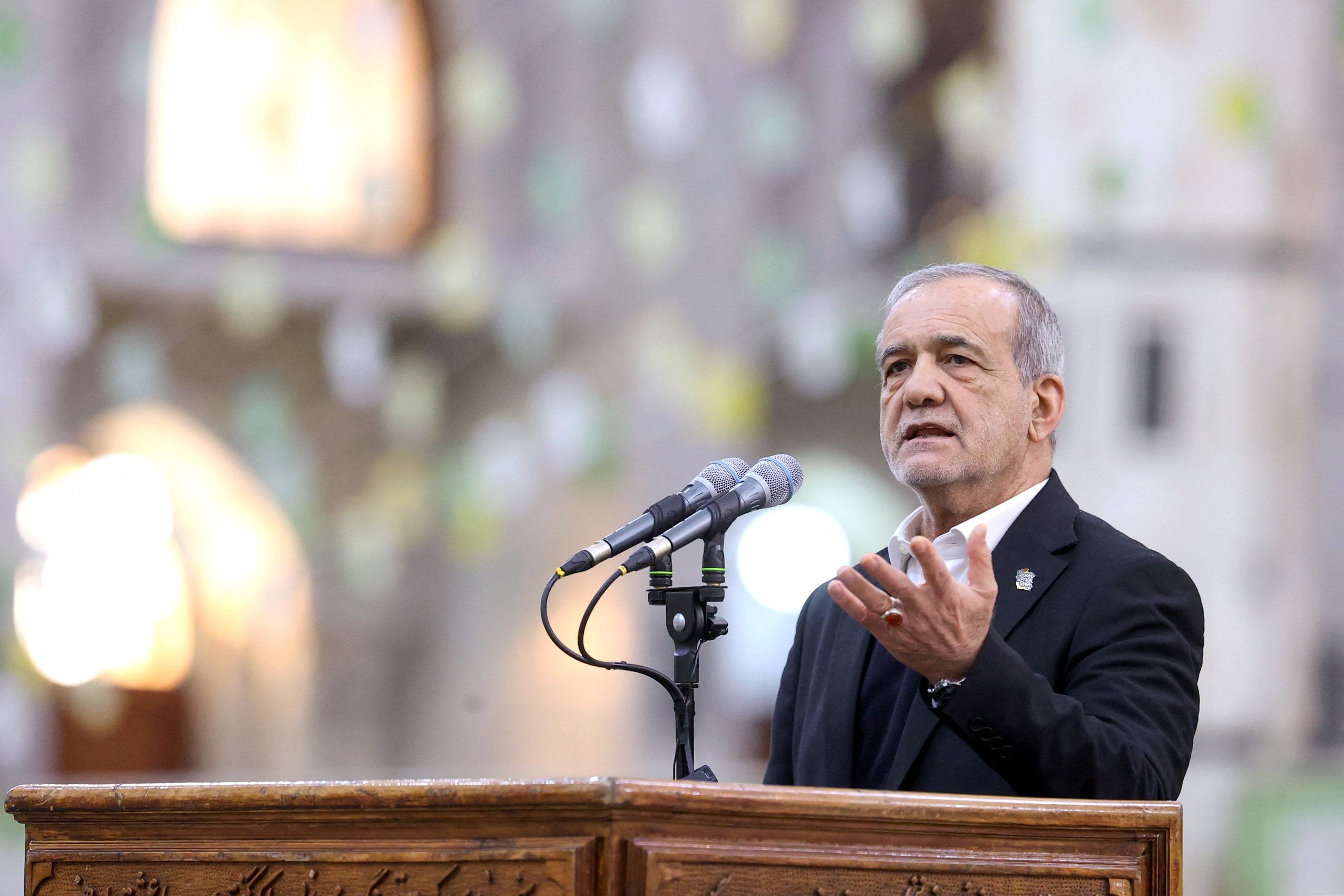 <i>Aboutaleb Nadri/Iran's Presidential website/WANA/Reuters via CNN Newsource</i><br/>Iranian President Masoud Pezeshkian speaks during a visit to a shrine in Tehran on January 31