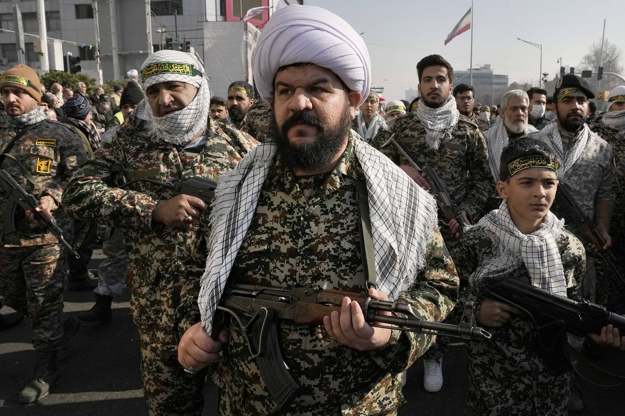 <i>Vahid Salemi/AP via CNN Newsource</i><br/>Members of the Iran's Basij paramilitary force march during a military parade held in the capital Tehran on January 10