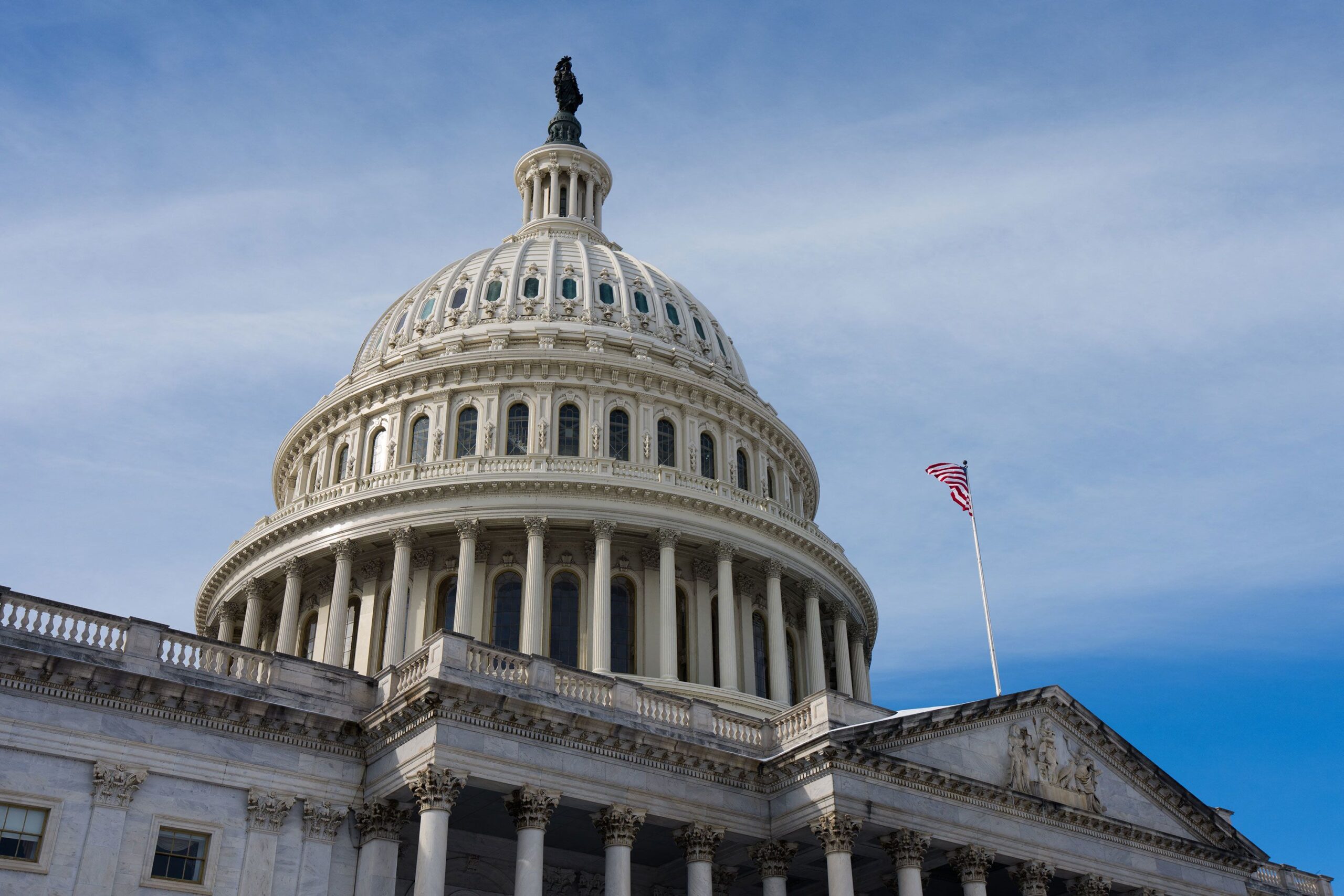 <i>Aaron Schwartz/AFP/Getty Images via CNN Newsource</i><br/>A US flag flies on the US Capitol in Washington