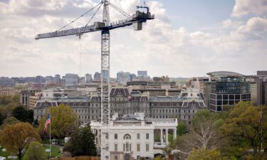 A construction crane stands over the White House on Wednesday.