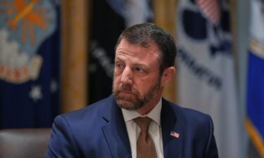 Homeland Security Secretary Markwayne Mullin listens during a Cabinet meeting at the White House on March 26.