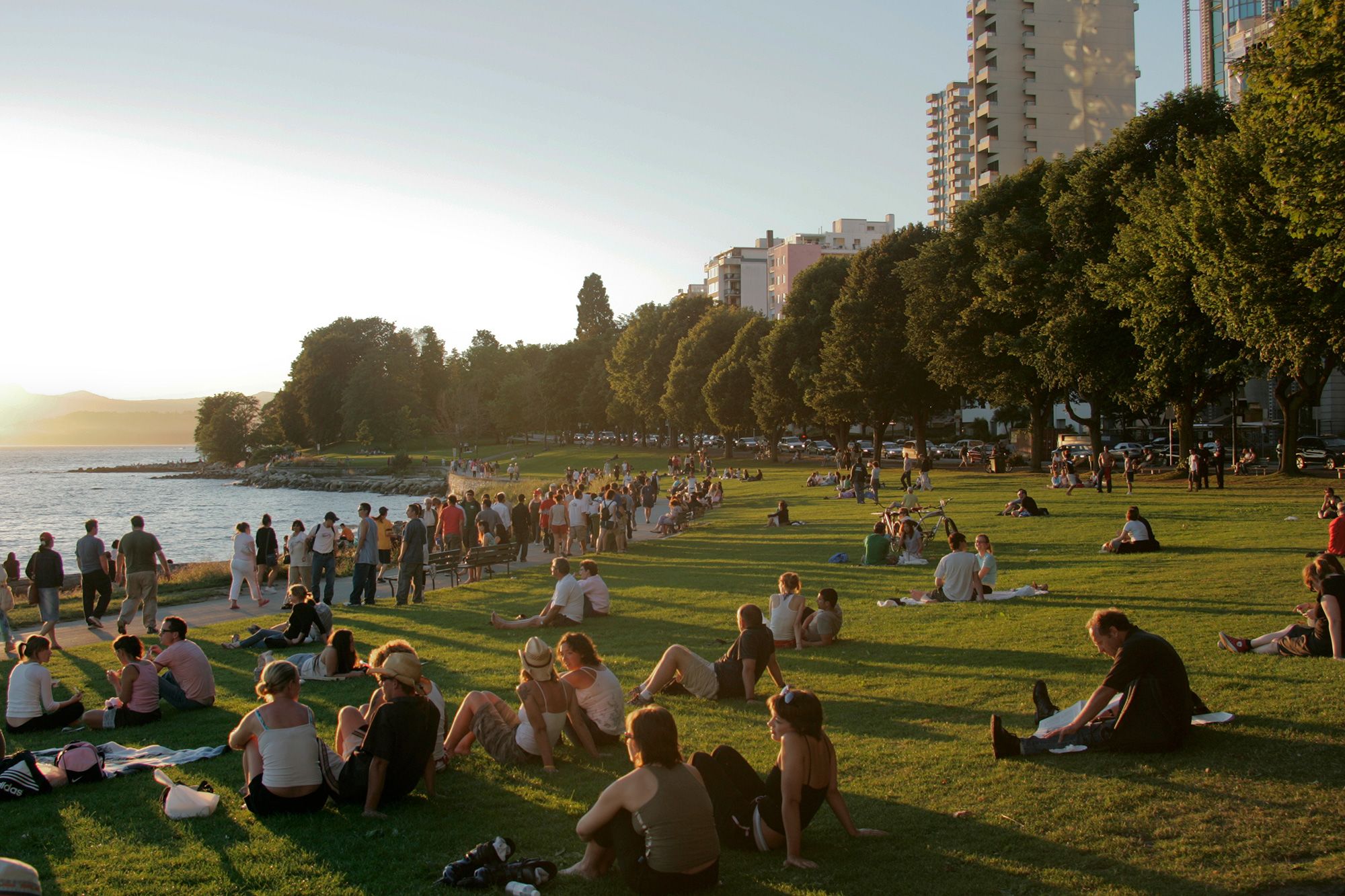 <i>Joel Rogers/Corbis Documentary RF/Getty Images via CNN Newsource</i><br/>Crowds gather for a sunset at English Bay Beach in Vancouver in the Canadian province of British Columbia.