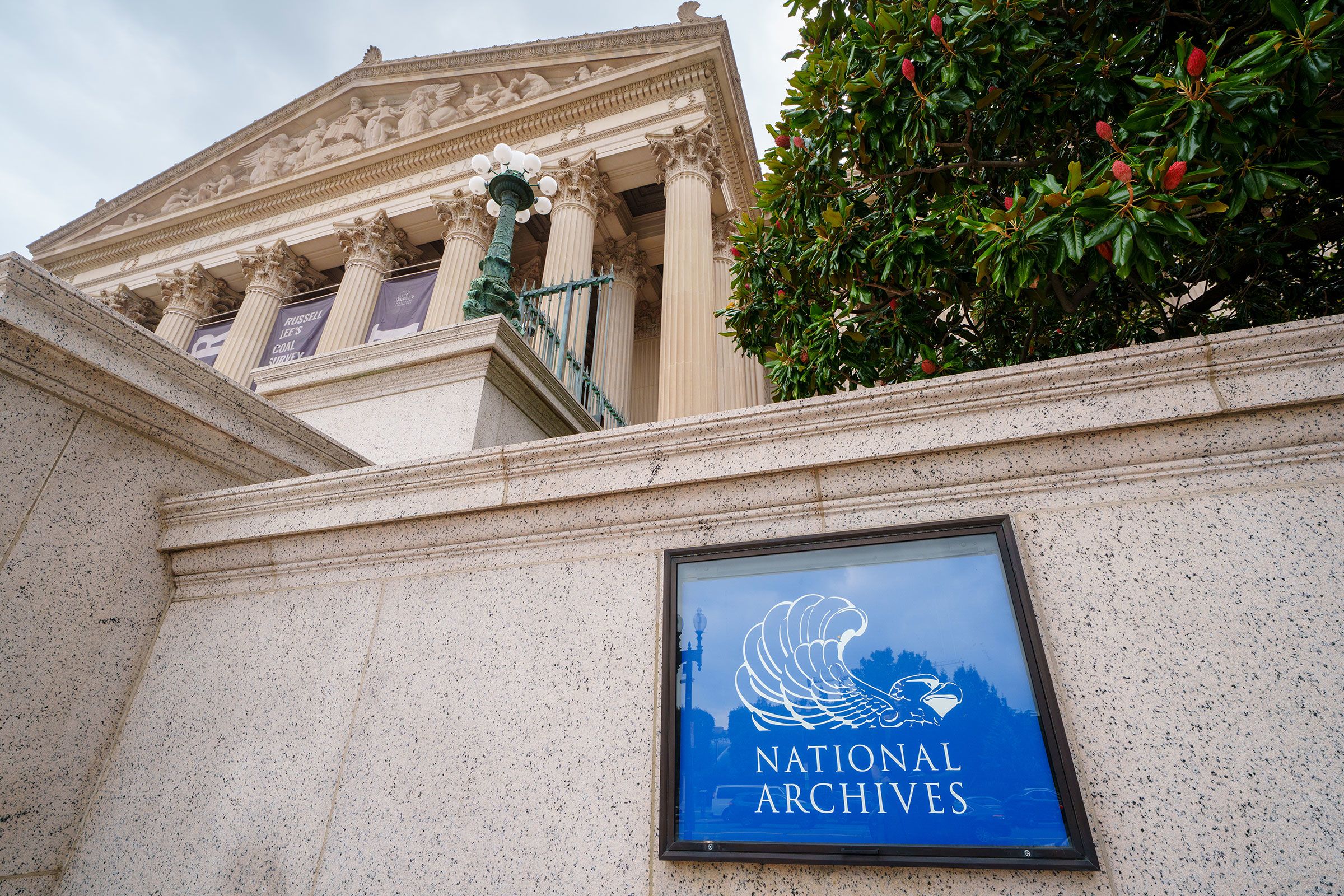 <i>J. David Ake/Getty Images/File via CNN Newsource</i><br/>A sign marks the location of the Archives of the United States building in Washington