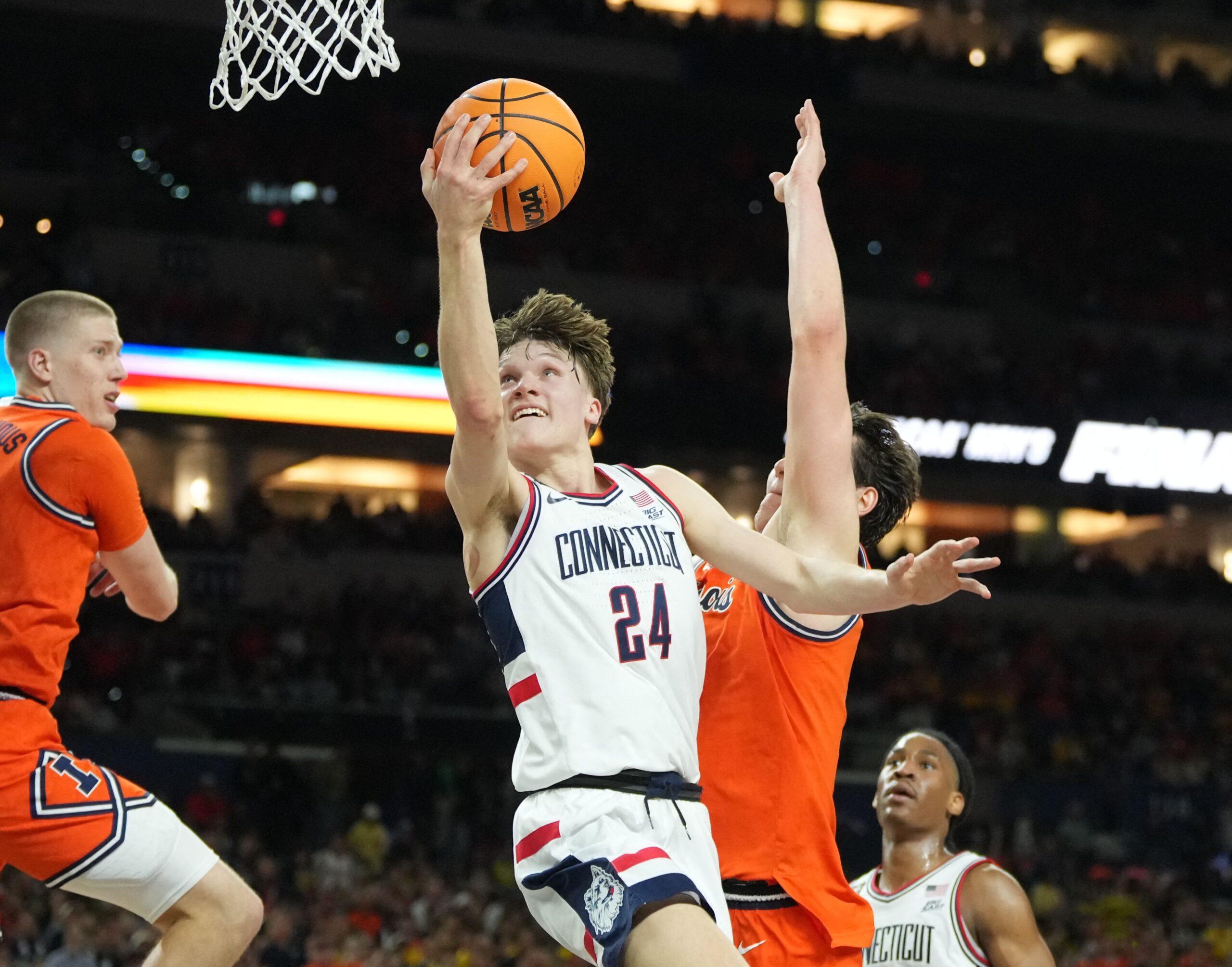 <i>Trevor Ruszkowski/Imagn Images/Reuters via CNN Newsource</i><br/>UConn head coach Dan Hurley gestures to the crowd after a postgame interview.