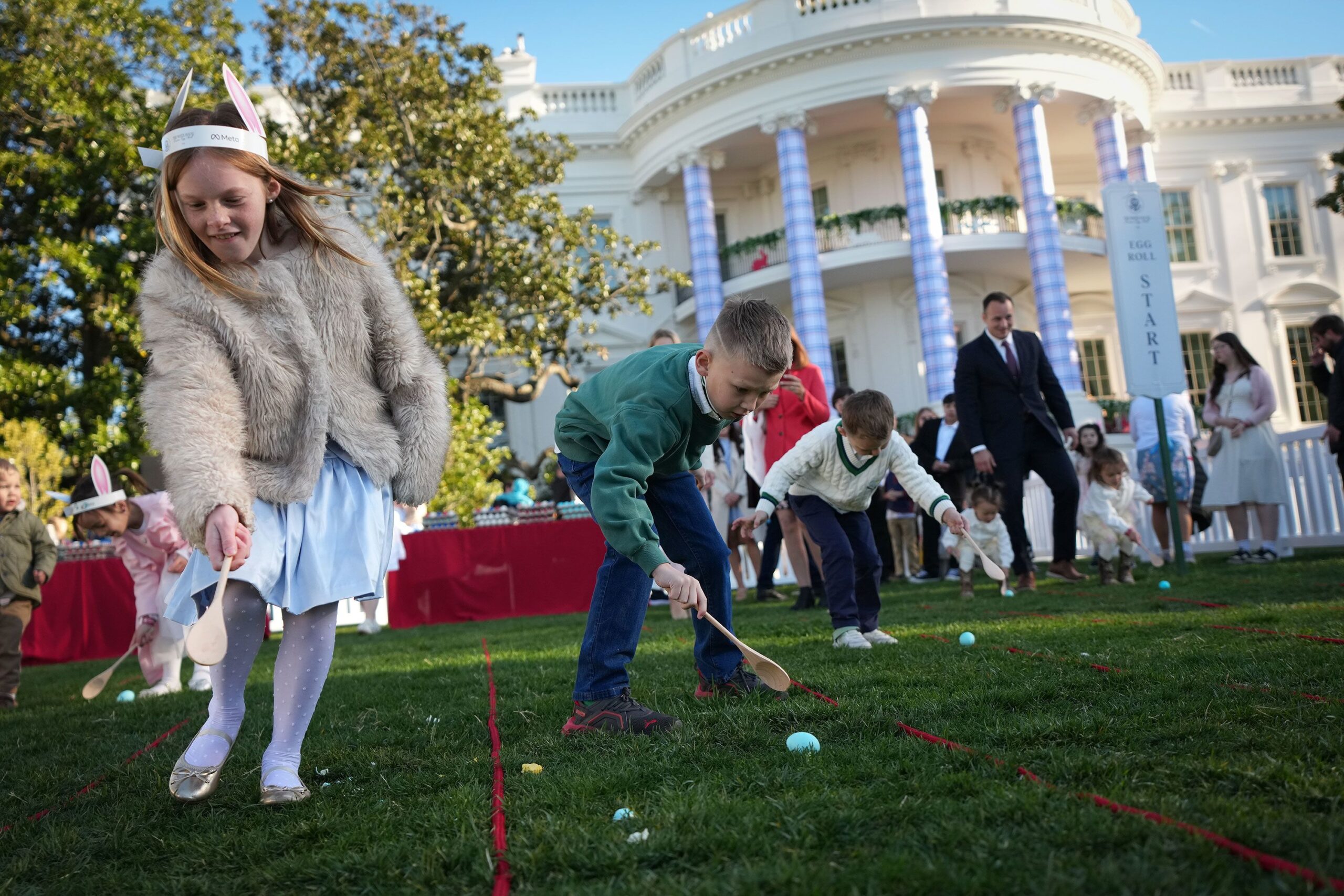 <i>Saul Loeb/AFP/Getty Images via CNN Newsource</i><br/>President Donald Trump greets the crowd during the annual Easter Egg Roll on Monday.