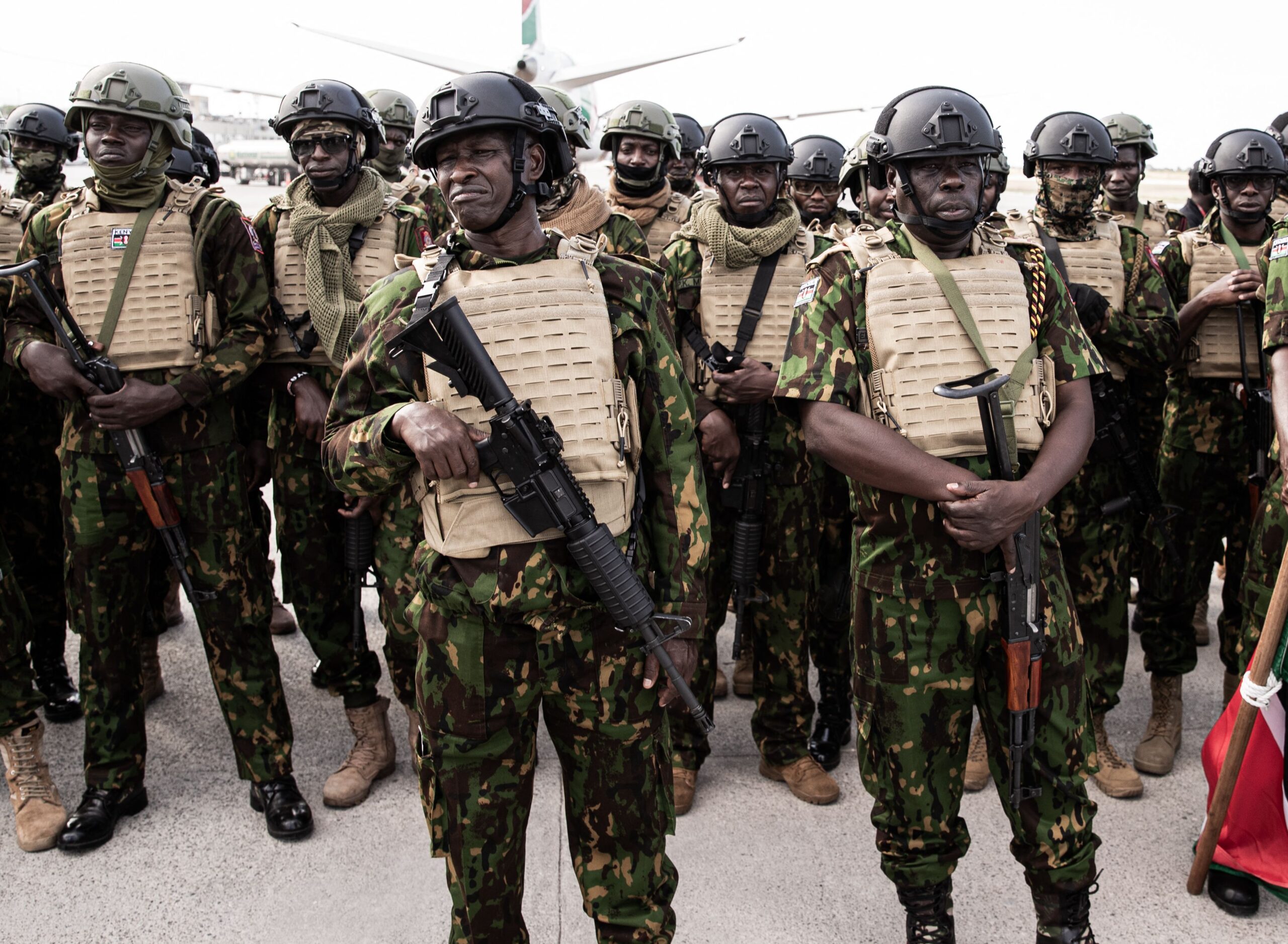 <i>Clarens Siffroy/AFP/Getty Images via CNN Newsource</i><br/>Kenyan police officers arrive at Toussaint Louverture International Airport in Port-au-Prince