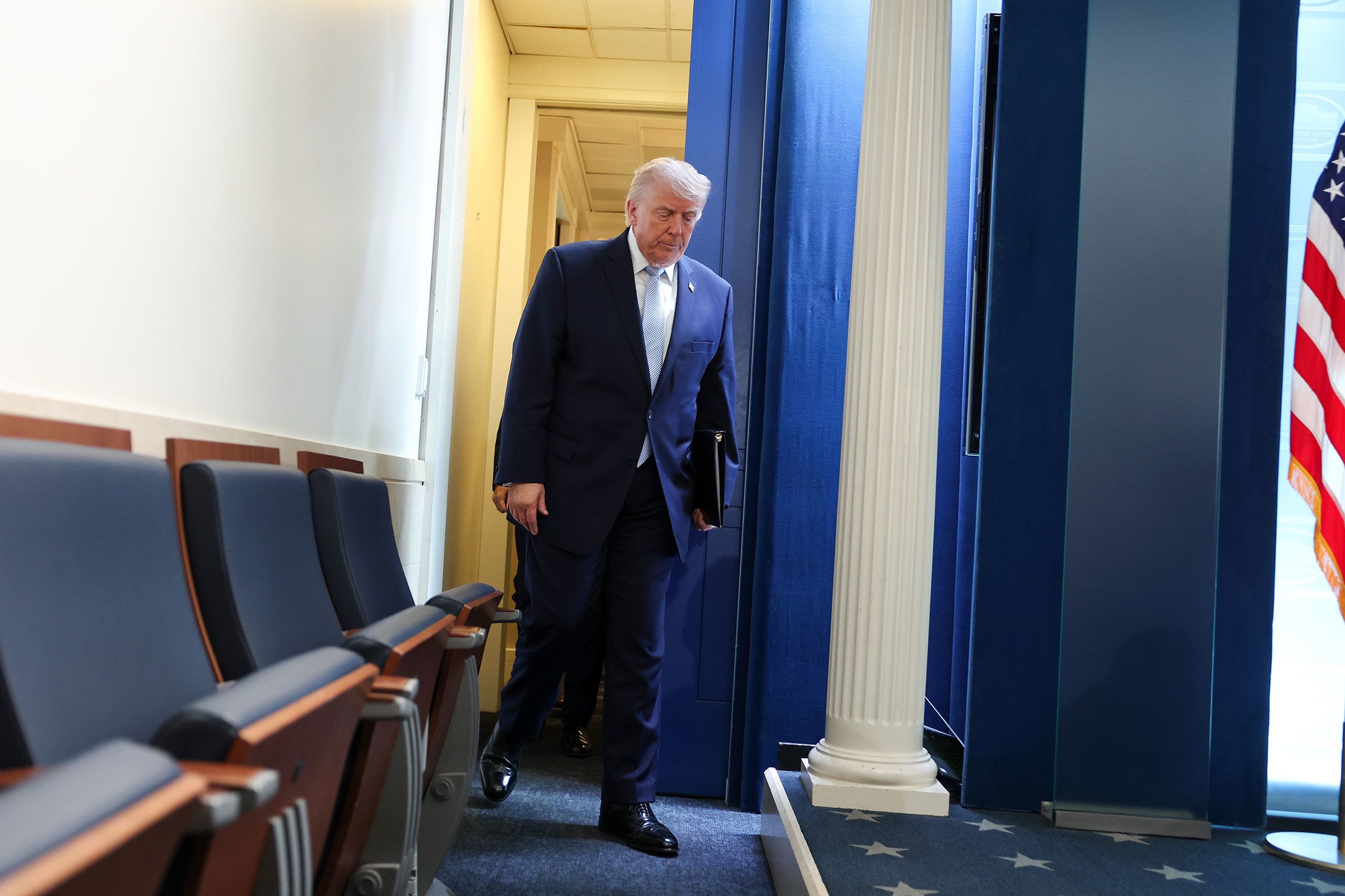 <i>Anna Moneymaker/Getty Images via CNN Newsource</i><br/>President Donald Trump arrives for a news conference in James S. Brady Press Briefing Room of the White House on Monday.