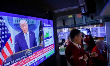 President Donald Trump is shown on a TV on the floor of the New York Stock Exchange on April 6.