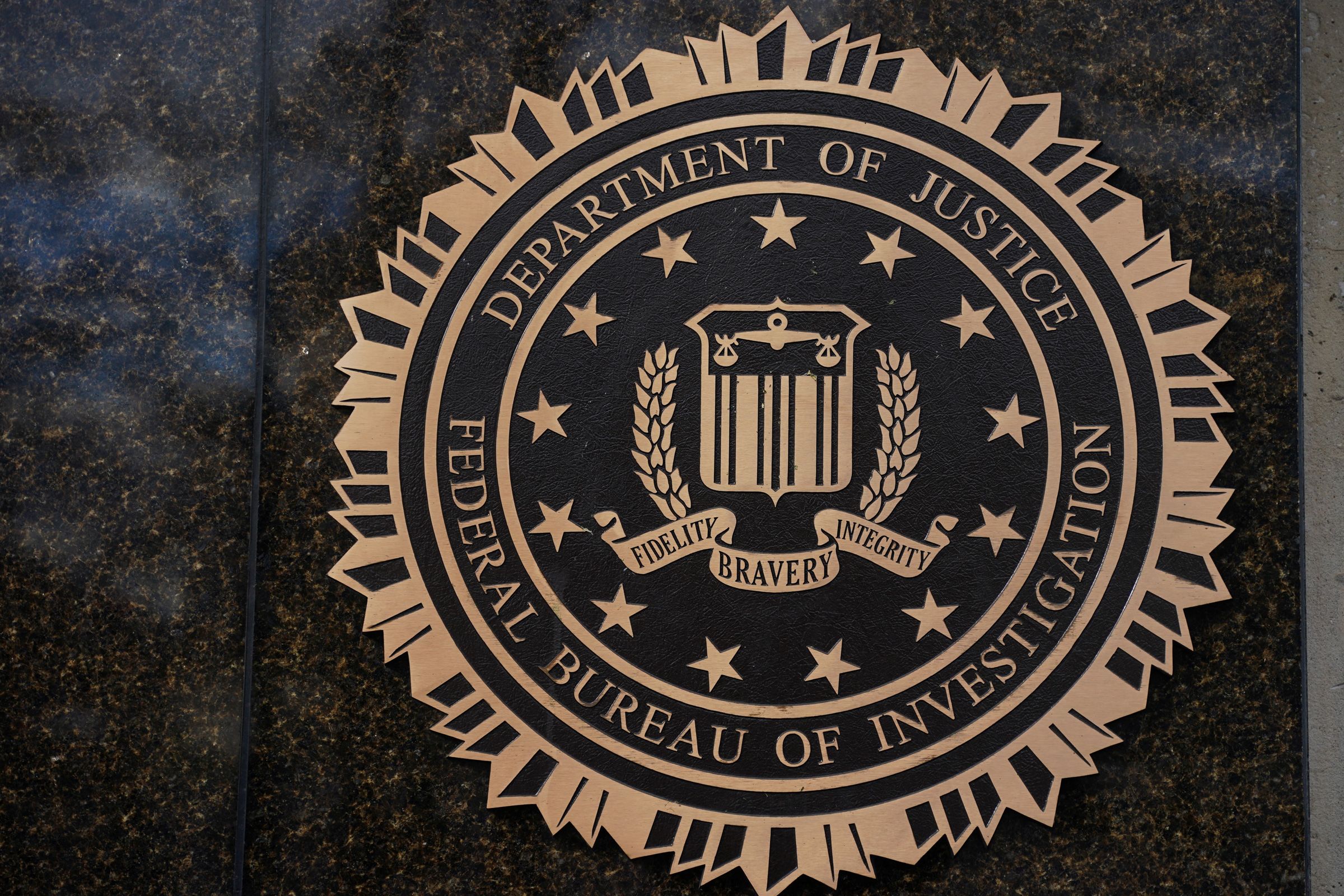 <i>Nathan Howard/Reuters via CNN Newsource</i><br/>The logo of the Federal Bureau of Investigation (FBI) is displayed on the building in Washington