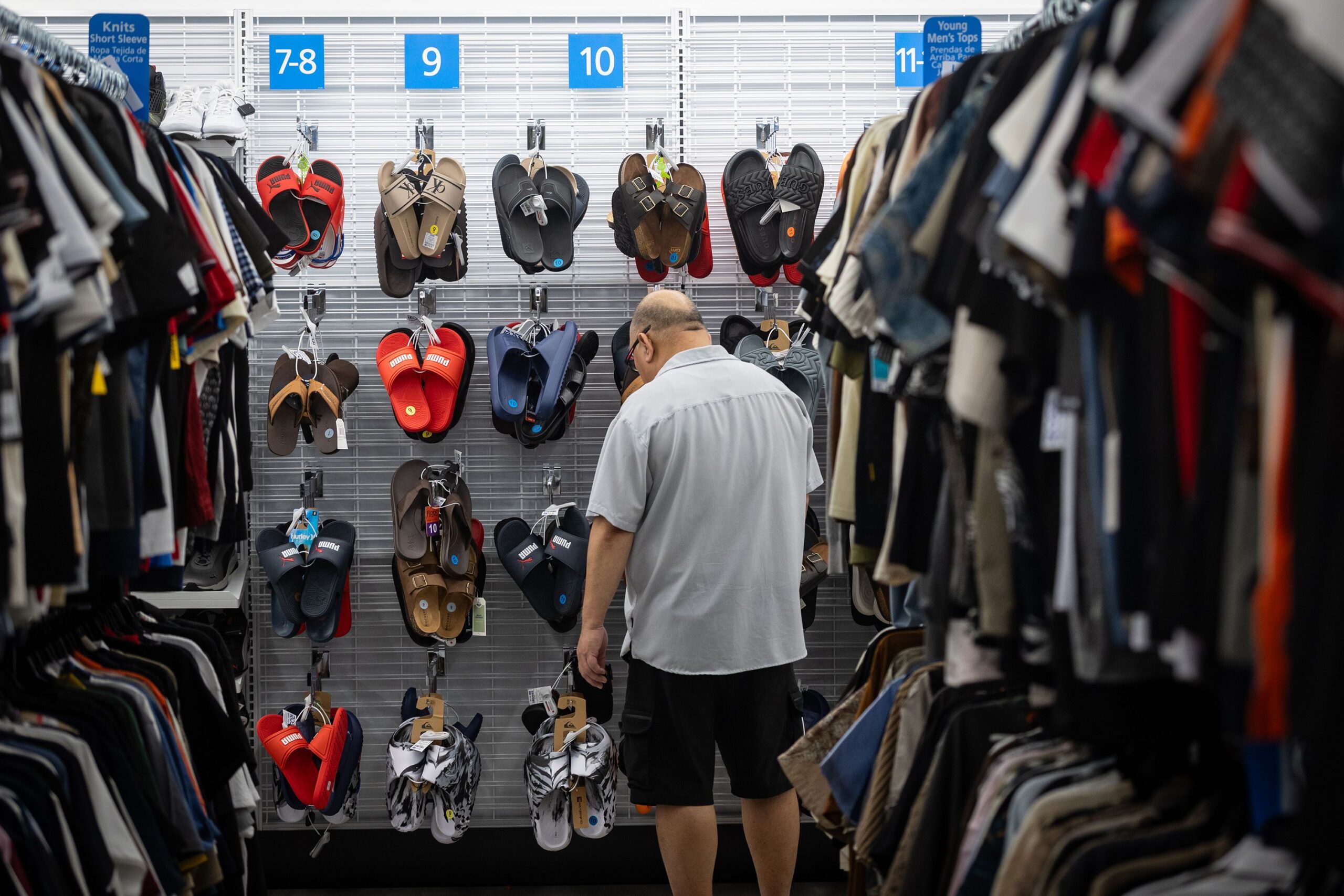 <i>Jason Armond/Los Angeles Times/Getty Images via CNN Newsource</i><br/>A man shops for sandals at a Ross store on March 17 in Alhambra