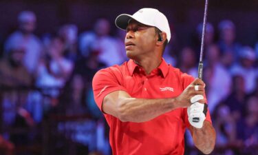 Tiger Woods of the Jupiter Links Golf Club plays his shot from the second tee the TGL finals golf tournament in Palm Beach Gardens