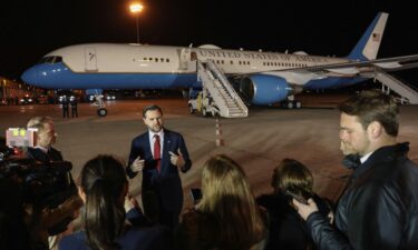 US Vice President JD Vance speaks to the media before boarding Air Force Two to return to Washington