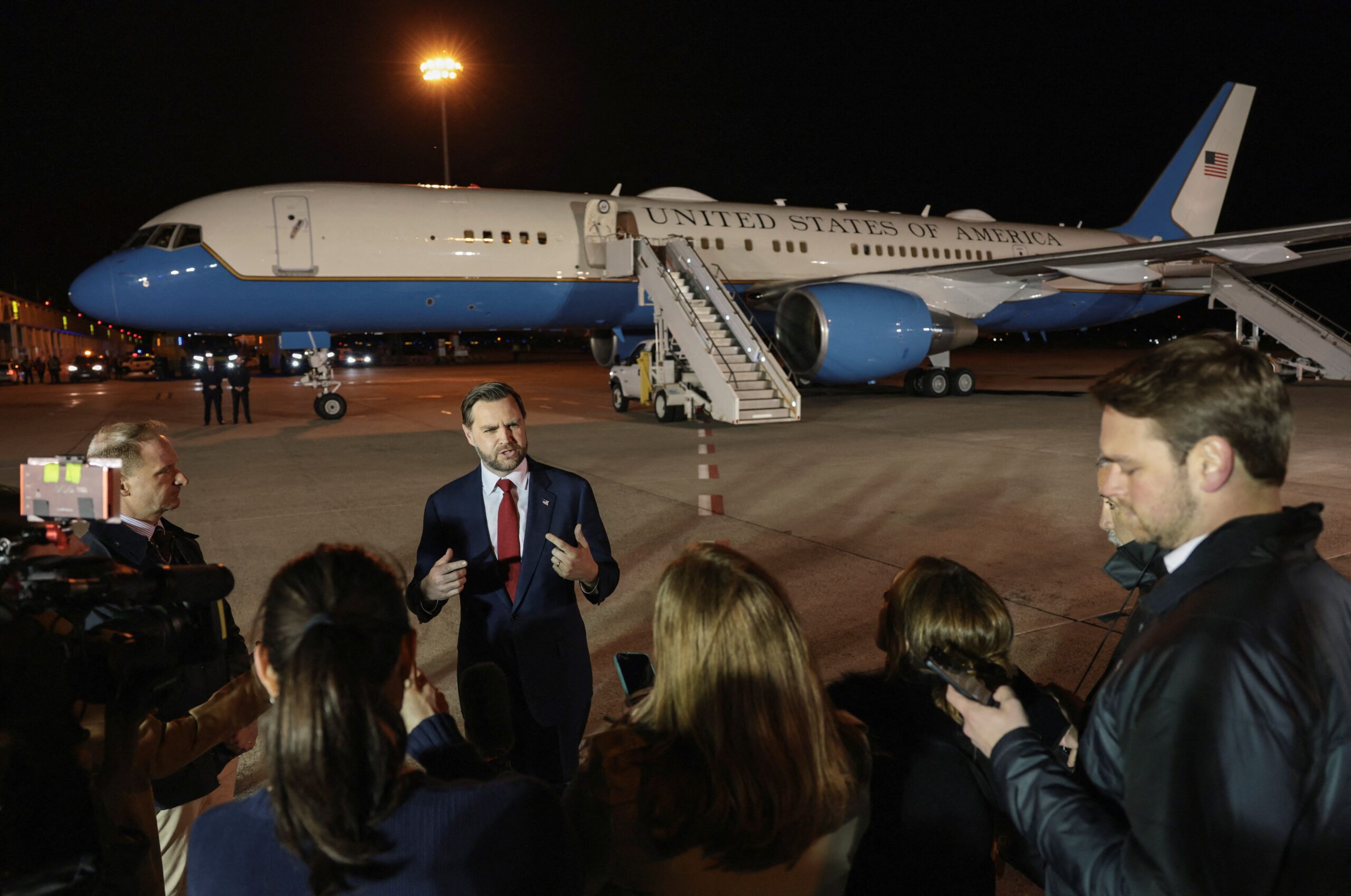 <i>Jonathan Ernst/Reuters/Pool via CNN Newsource</i><br/>US Vice President JD Vance speaks to the media before boarding Air Force Two to return to Washington