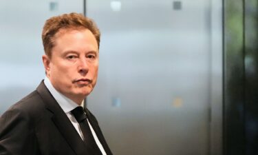 Elon Musk arrives at the US District Court in Oakland