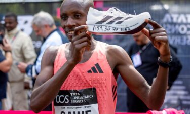 Sabastian Sawe (KEN) celebrates breaking the Marathon World Record in under two hours with an official time of 01:59:30 after crossing the finish line to win the Elite Men Race during the TCS London Marathon on Sunday 26th April 2026.