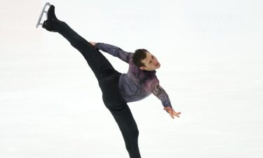 Jason Brown strikes a pose during a figure skating routine.