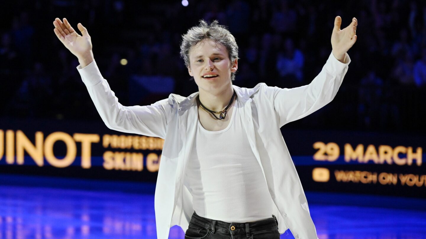 <i>NBC Olympics</i><br/>Ilia Malinin poses on the ice during a figure skating event.