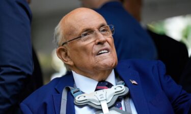 Former New York Mayor Rudy Giuliani participates in a ceremony commemorating the anniversary of the 9/11 terror attacks in New York last year.