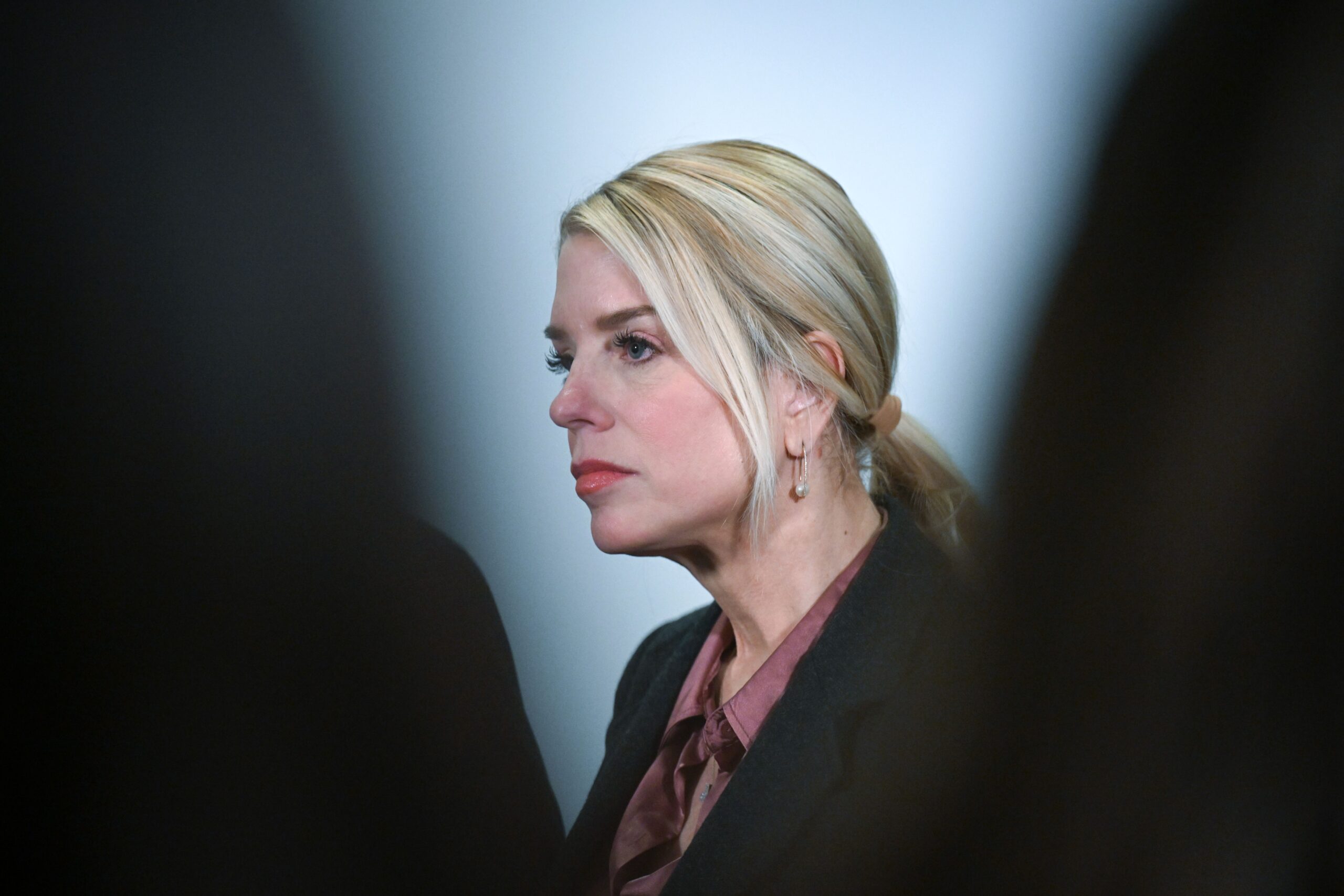 In this March 18 photo, then-US Attorney General Pam Bondi answers questions from the media at the United States Capitol in Washington, DC.