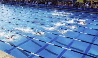 Swimmers compete in the pool during the Pro Swim Series event in Sacramento