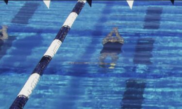 Swimmers compete in the pool during the Pro Swim Series event in Sacramento
