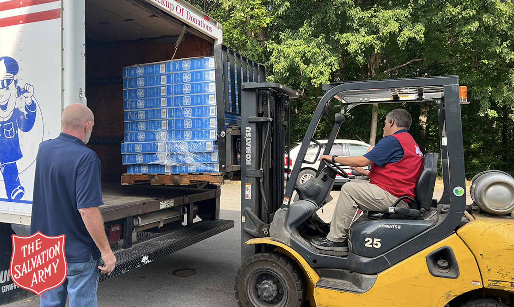 A Westlake Ace Hardware employee loads up a box truck with fans. 