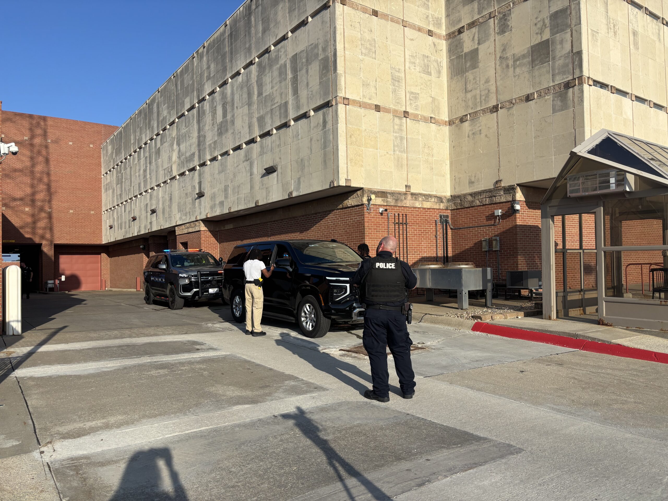 Sgt. James Edwards watching explorer program participant do a de-escalation scenario. 