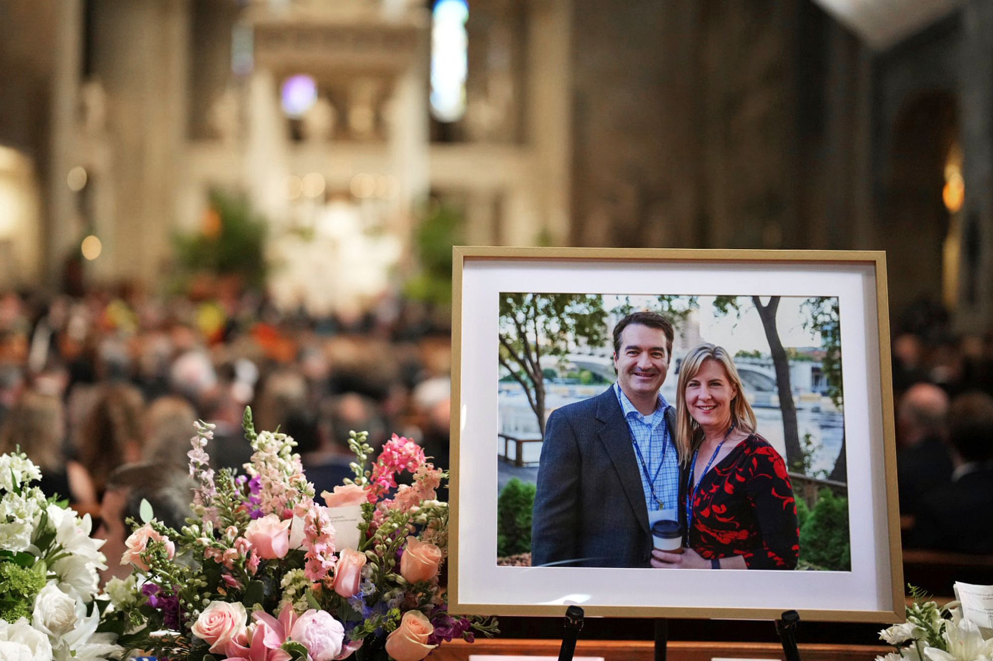 A photo of Mark and Melissa Hortman is displayed during their funeral service inside the sanctuary at the Basilica of St. Mary's in Minneapolis on June 28, 2025.