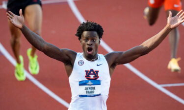Auburn’s Ja’Kobe Tharp sets a world record in the semifinals of the men’s 110-meter hurdles during the NCAA Outdoor Track & Field Championships on June 10