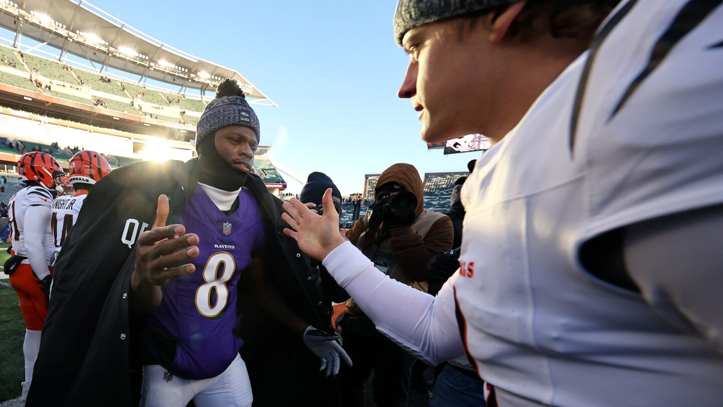 <i>NBC Olympics</i><br/>Lamar Jackson shakes hands on the field with Joe Burrow.
