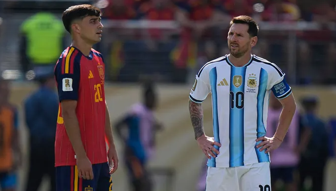 Argentina's Lionel Messi (10) stands next to Spain's Pedri (20) during the World Cup final soccer match between Spain and Argentina in East Rutherford, N.J., near New York, Sunday, July 19, 2026.
