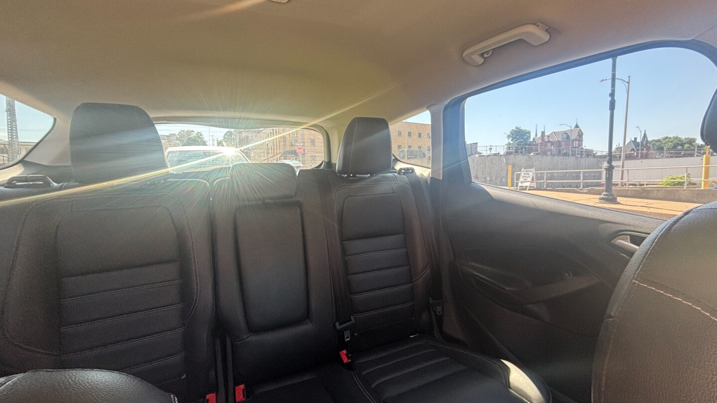 The backseat of a parked car.