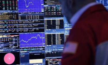 Traders work on the floor of the New York Stock Exchange on July 8.